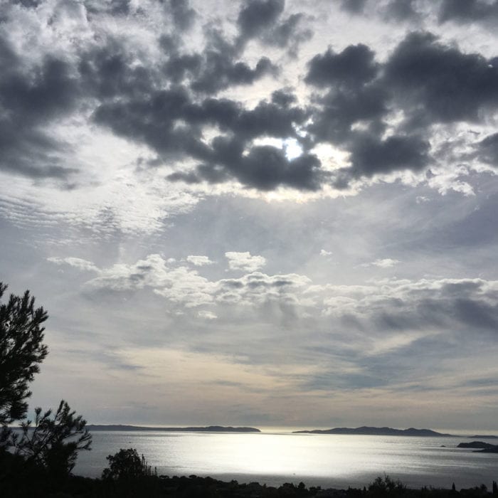 A cloud mix over the village of Lavandou with a view of the Isles d'or, France.