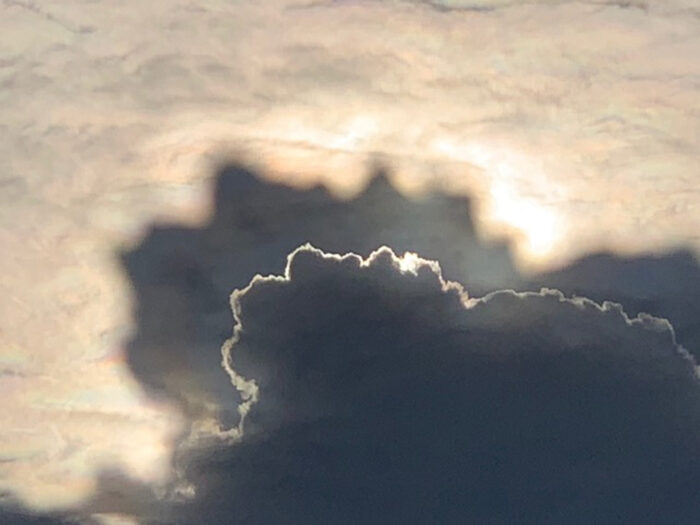 A silver lining with shadows over Minnie Water, Australia.