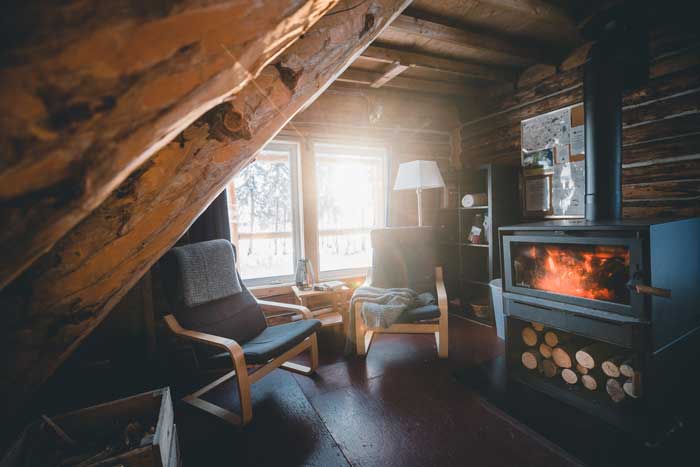 The traditional log cabins are heated by log-burning stoves.