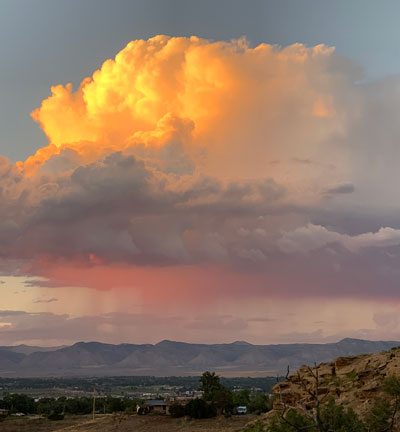 Cumulonimbus and Cumulus congestus clouds spotted by Maya Kraushaar over Grand Junction, Colorado, US.