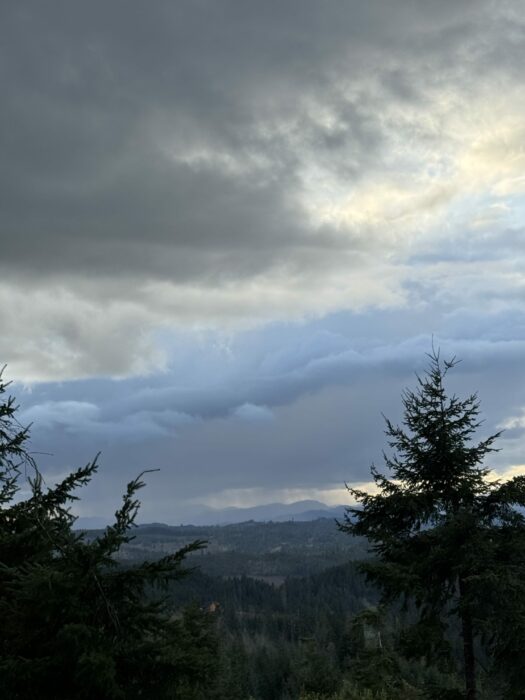 Shortly before sunset, precipitation falling in the distance as storm clouds developed near Eugene, Oregon, US