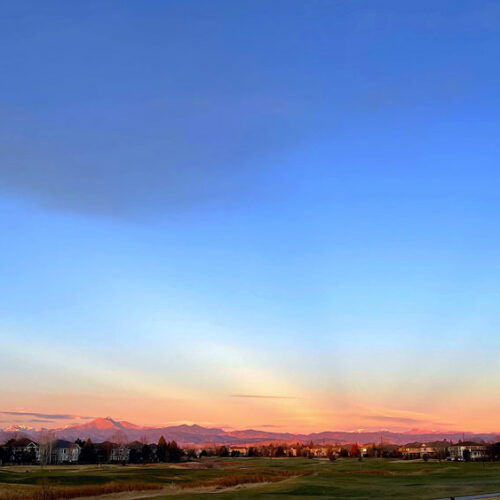 A sunrise with anti-crepuscular rays over Longmont, Colorado, US.