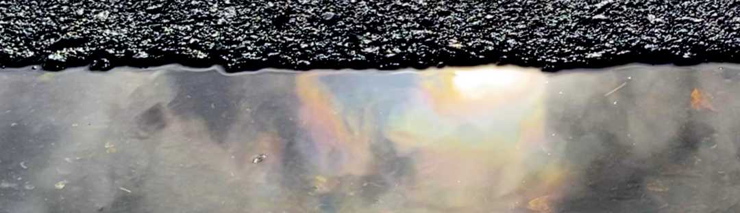 Cloud Iridescence Reflected in Rainwater